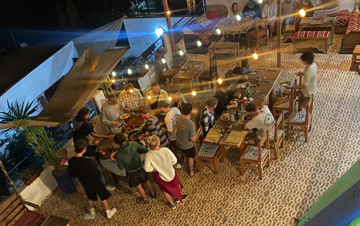 Eating dinner at the Surfcamp in Tamraght during a surf holiday to Morocco